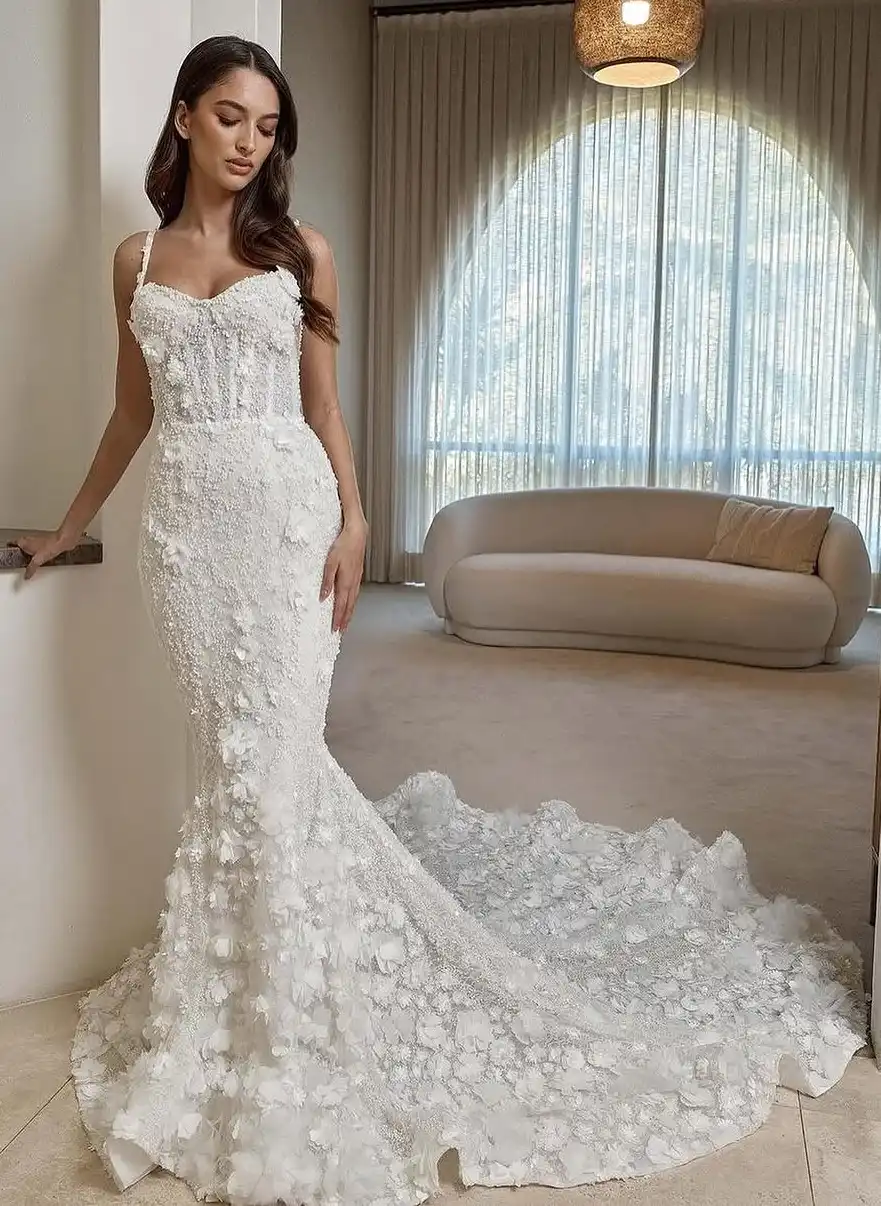 A Lace Wedding Dress with Dimensional Elegance