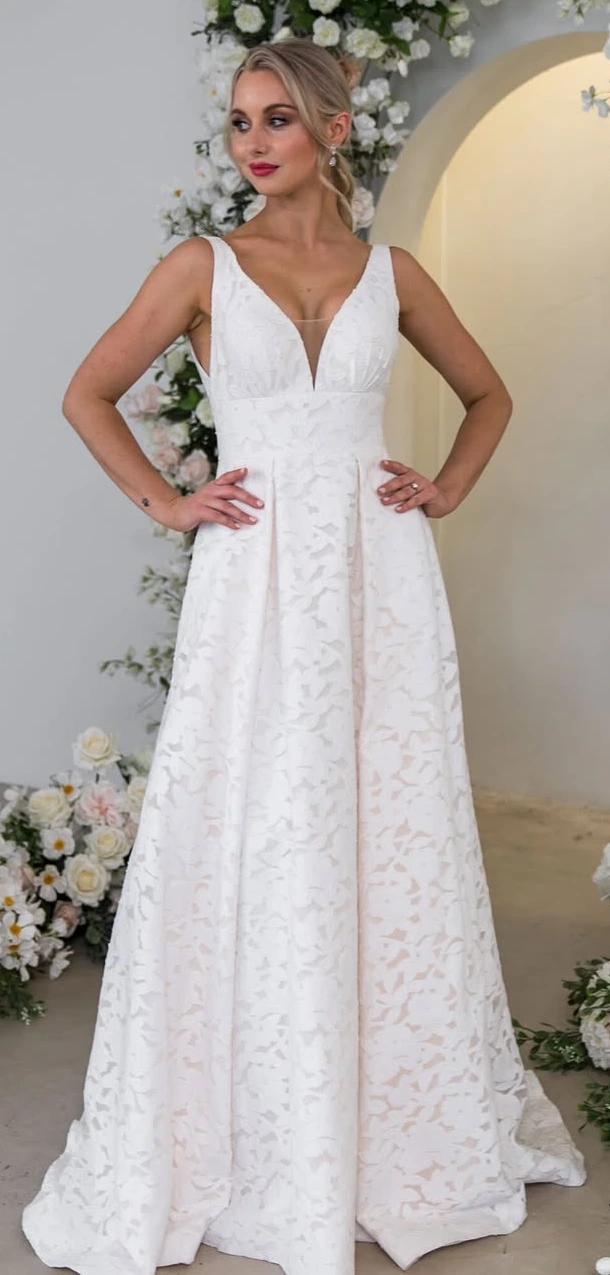 A Textured Lace Wedding Gown with Modern Grace