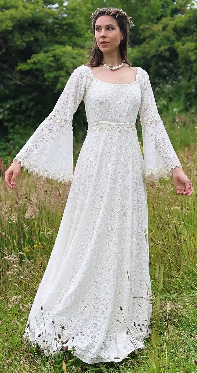 A Vintage-Inspired Lace Wedding Gown with Boho Flair