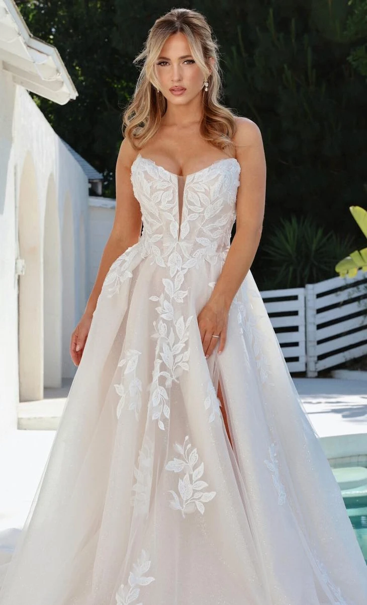 A Whimsical Lace Wedding Gown with Modern Allure