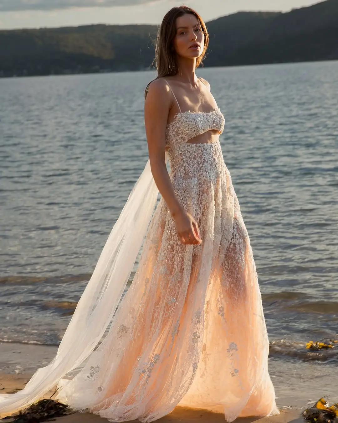 Ethereal Sunset Gown A Beach Wedding Dream in Motion