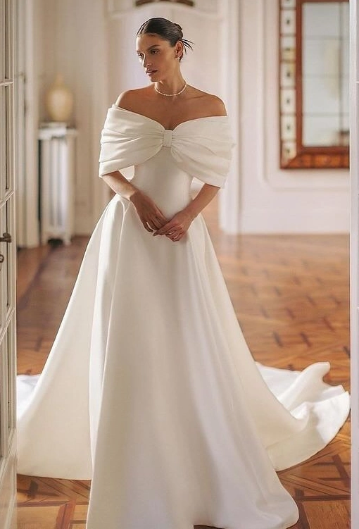 Off-Shoulder Wedding Dresses with Sculptural Elegance