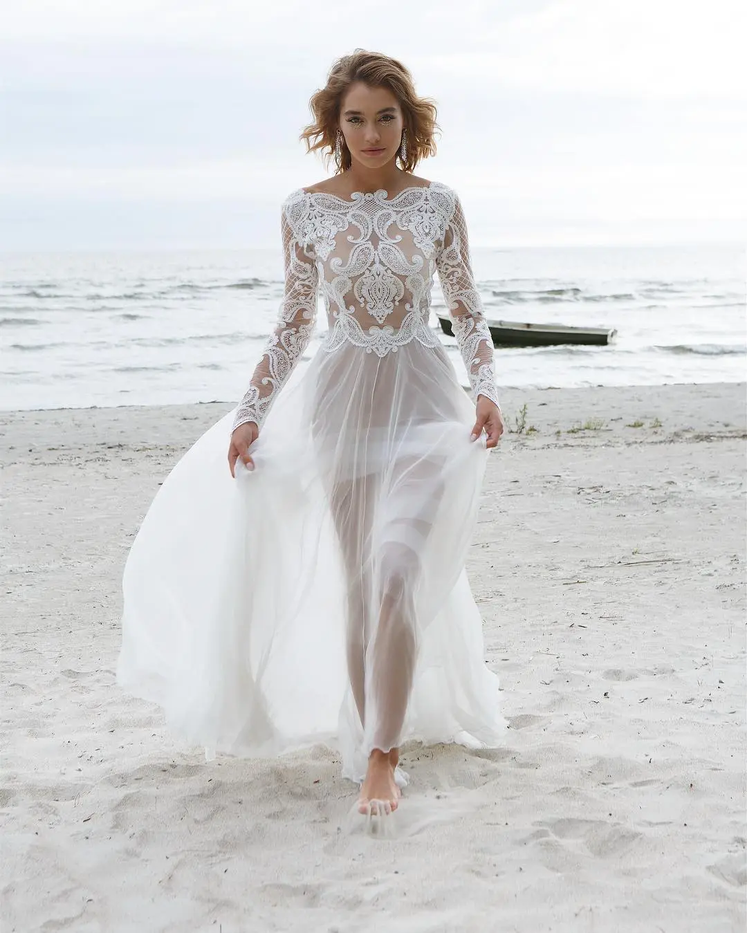 Windswept Lace A Sheer & Romantic Beach Wedding Gown