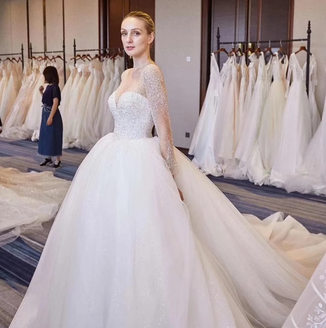 Beaded Sleeve Crystal Ballgown A Galaxy of Delicate Light